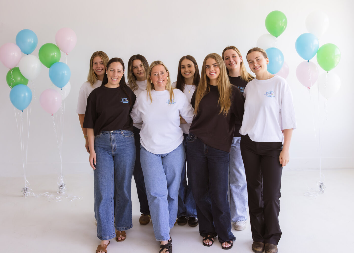 Essential Assistant Care team together at a studio event