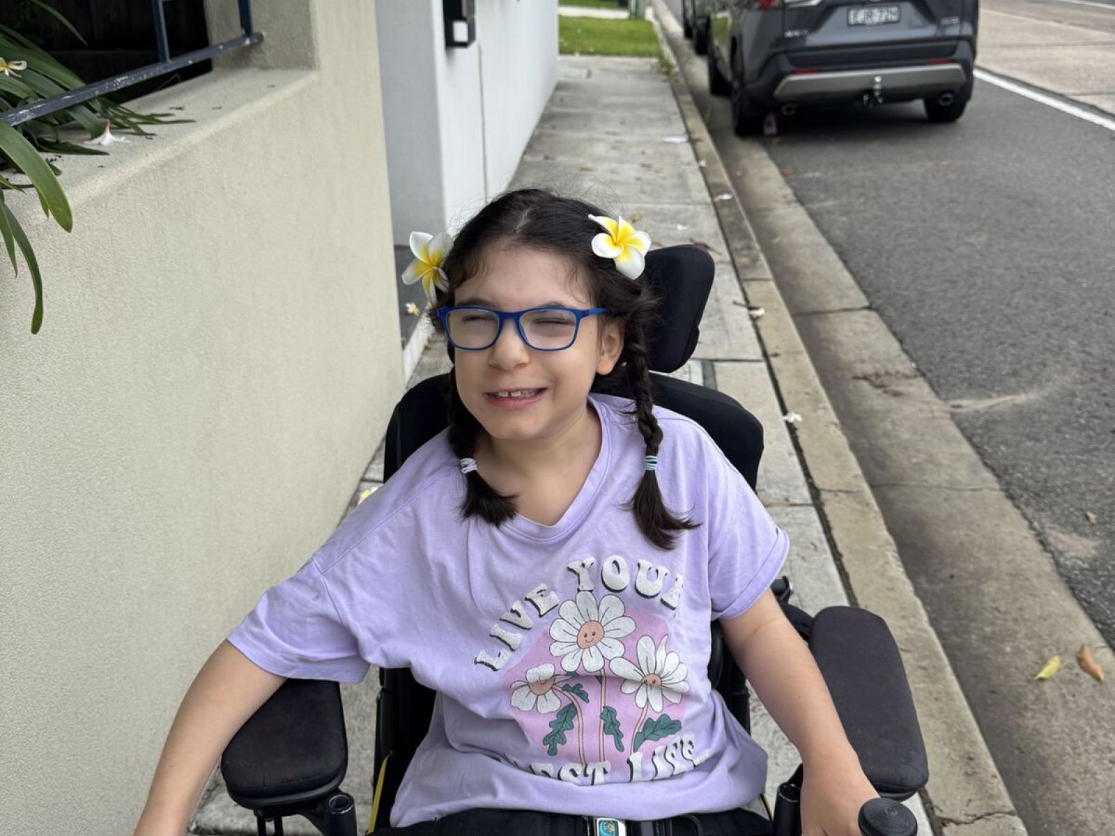 Participant using a wheelchair during a community outing